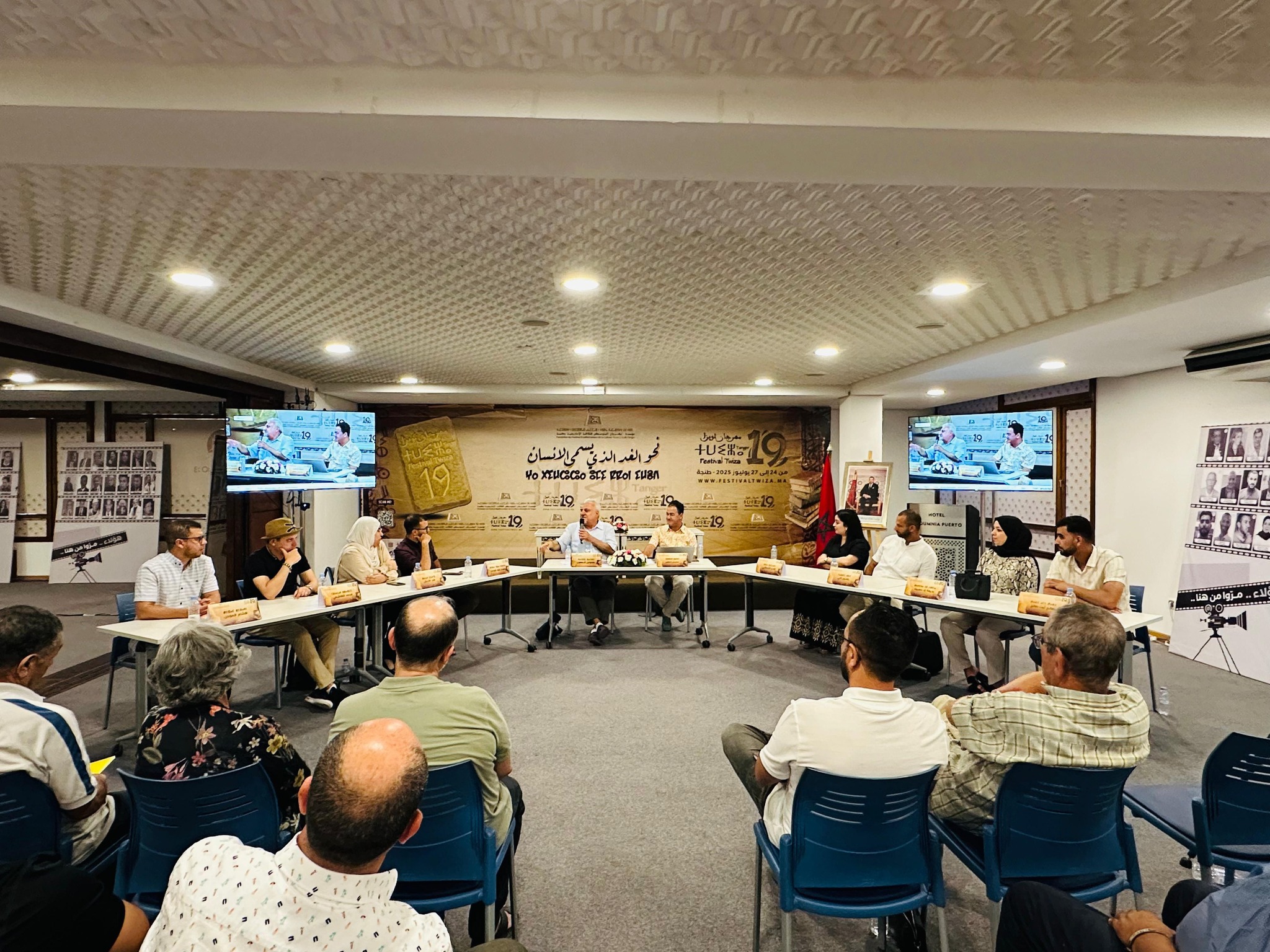 May be an image of 11 people, people studying and text