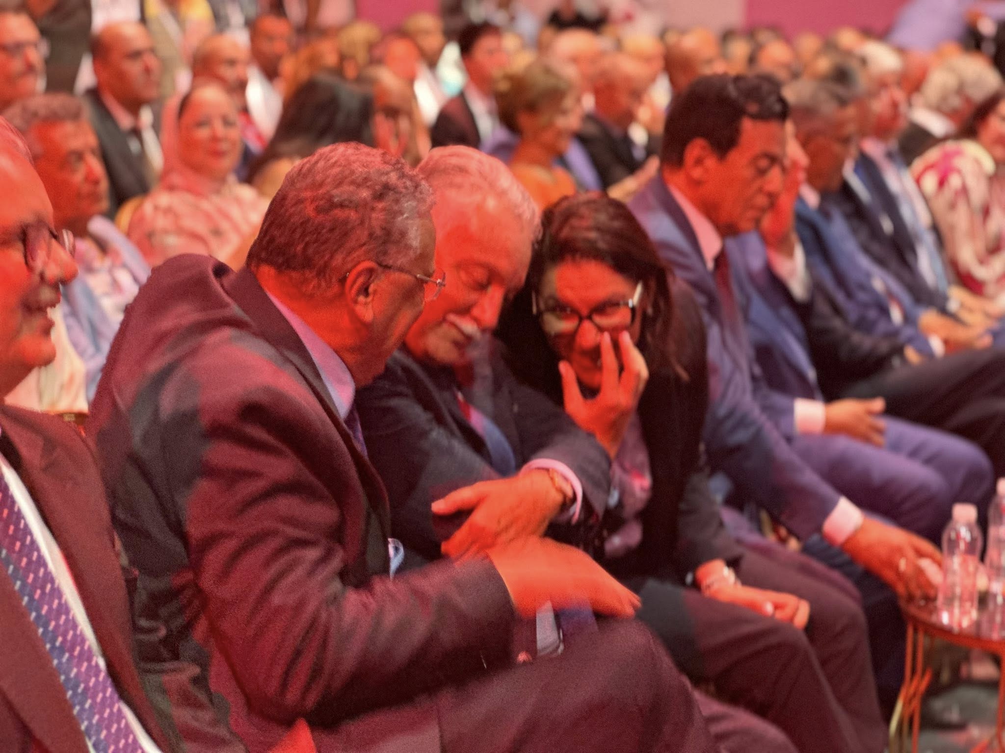 May be an image of one or more people, crowd and text